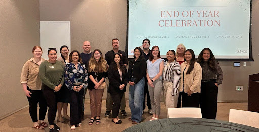 Mentor group posed for end of year celebration photo